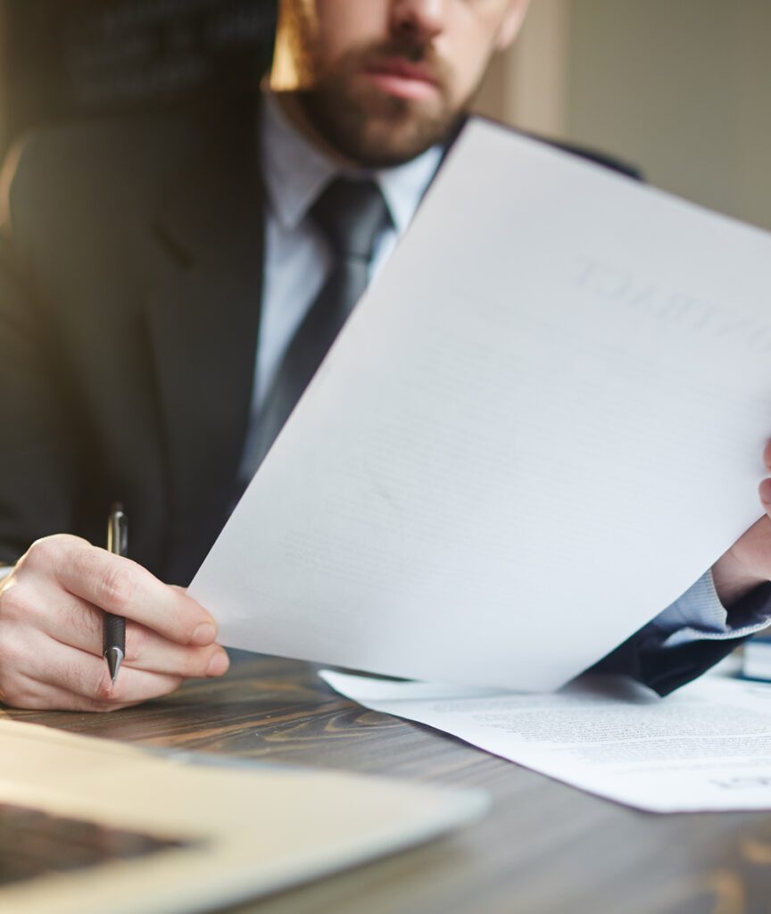 businessman-working-with-documentation-desk
